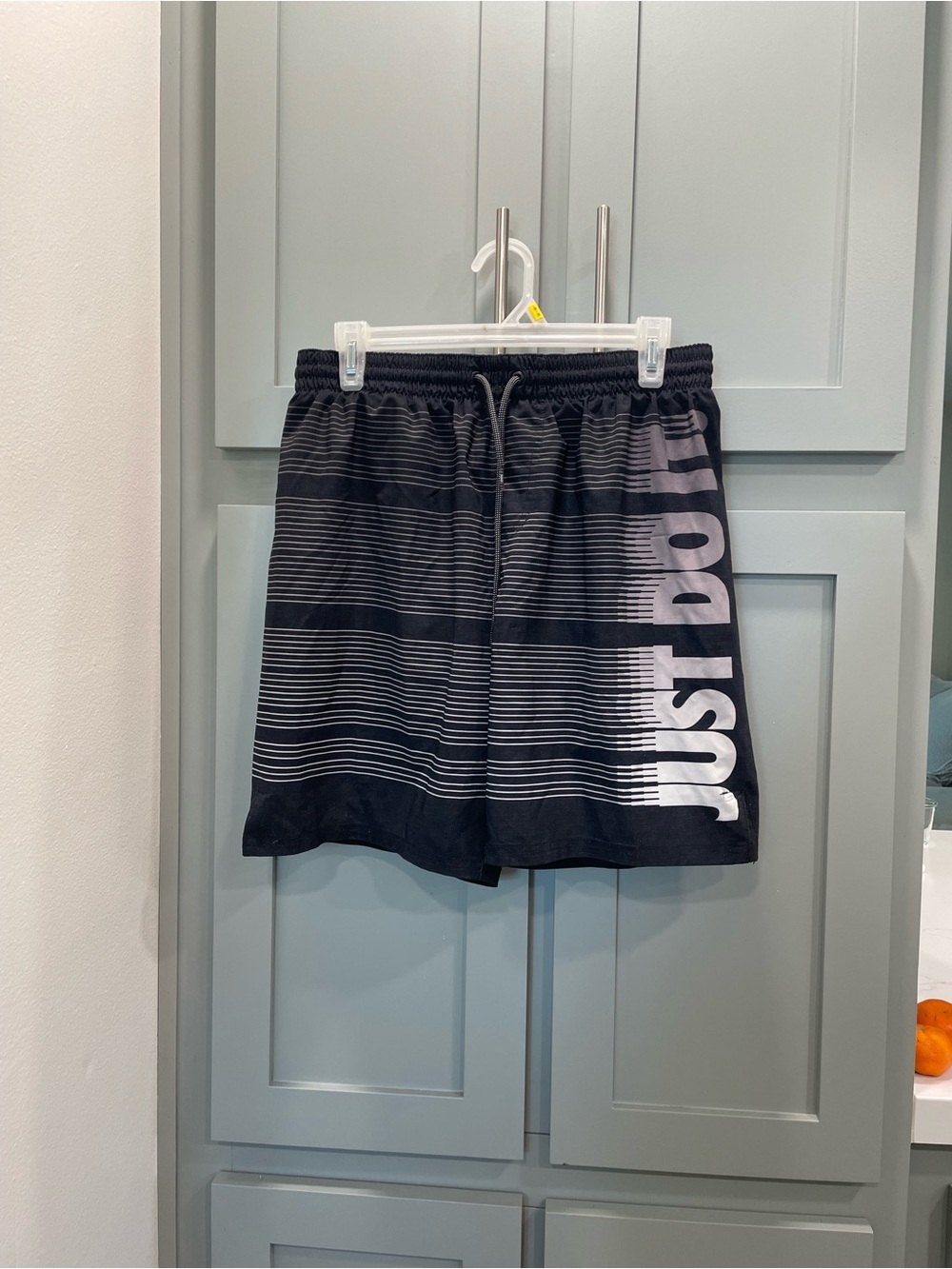 Nike Men's Black Athletic Shorts with White 'JUST DO' Print